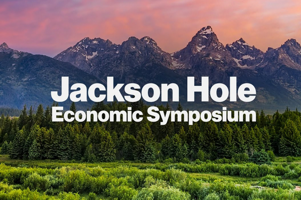 Montagne e pini sotto un cielo colorato con il testo Jackson Hole Economic Symposium in grassetto bianco.