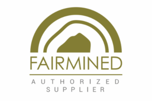 FAIRMINED Authorized Supplier logo featuring a stylized gold arch over a mountain outline, with the words FAIRMINED and AUTHORIZED SUPPLIER in capital letters below.