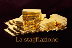 Una pila di lingotti d'oro lucidi è disposta in fila su una superficie scura, con la scritta in oro La stagflazione.